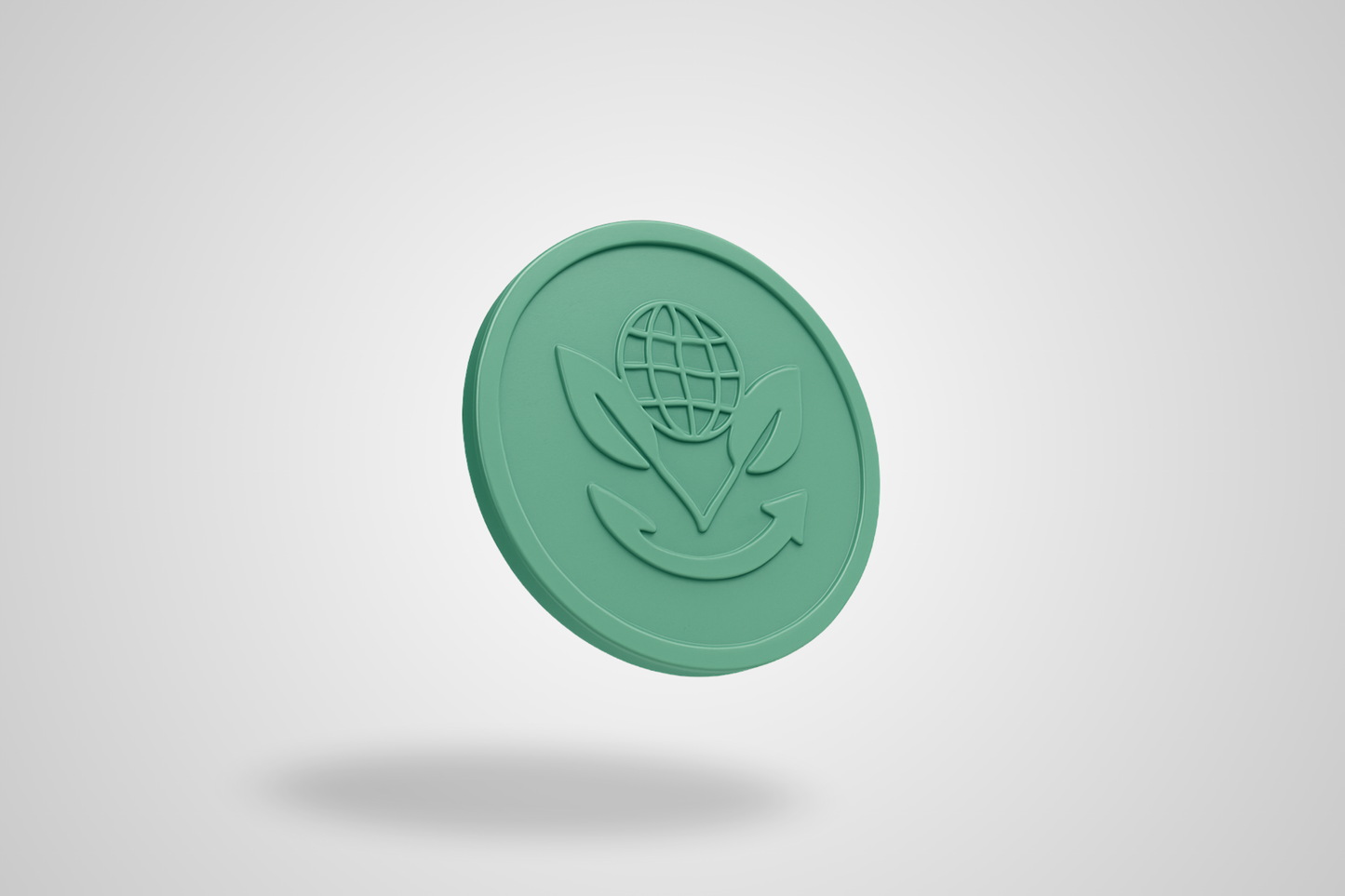 A photo of an embossed plastic token made from recycled plastic