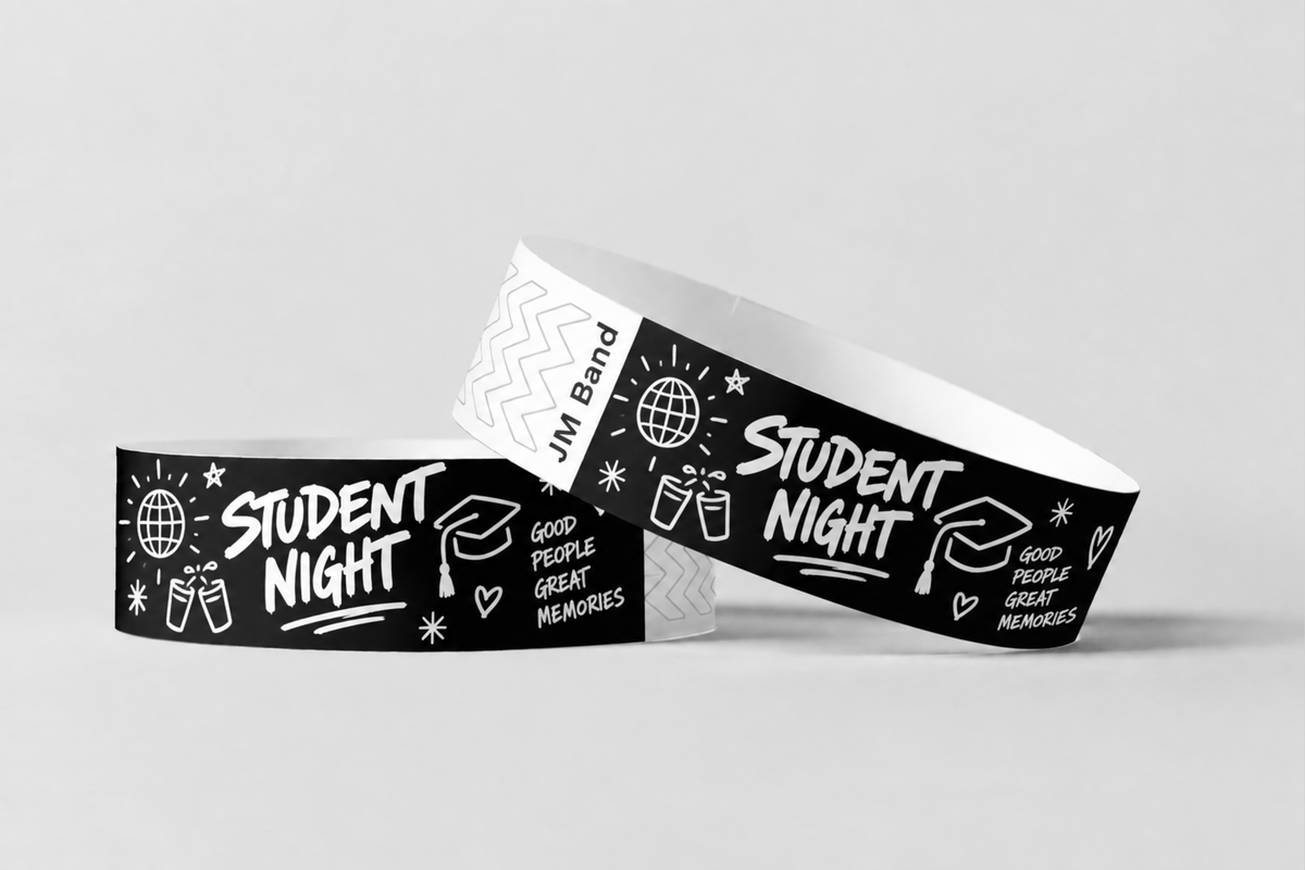 Zwei schwarze Papierarmbänder mit weißem Studentenparty-Druck