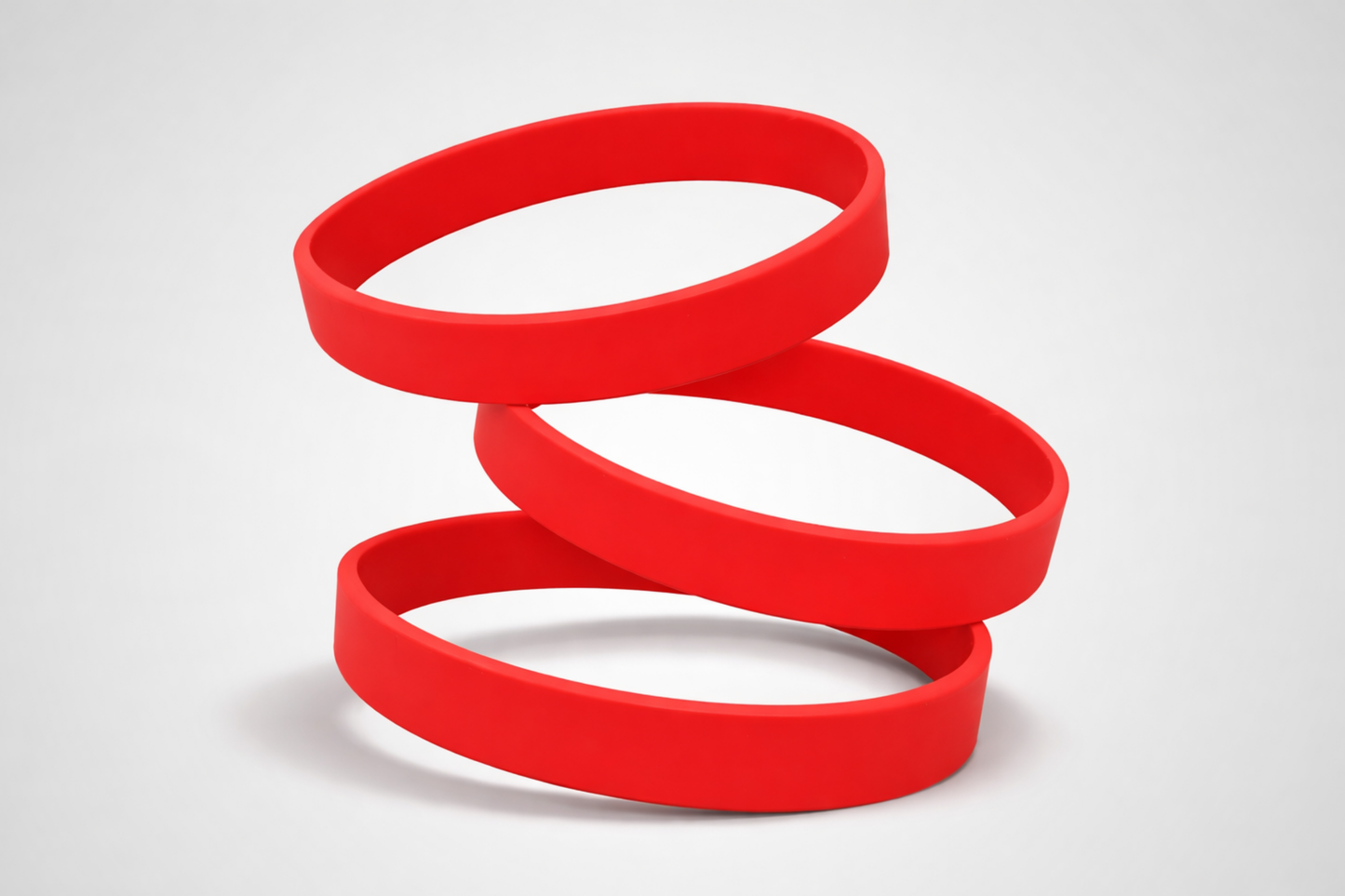 Rote, schlichte Silikonarmbänder. Silikonarmbänder ohne Aufdruck bei JM Band® kaufen.
